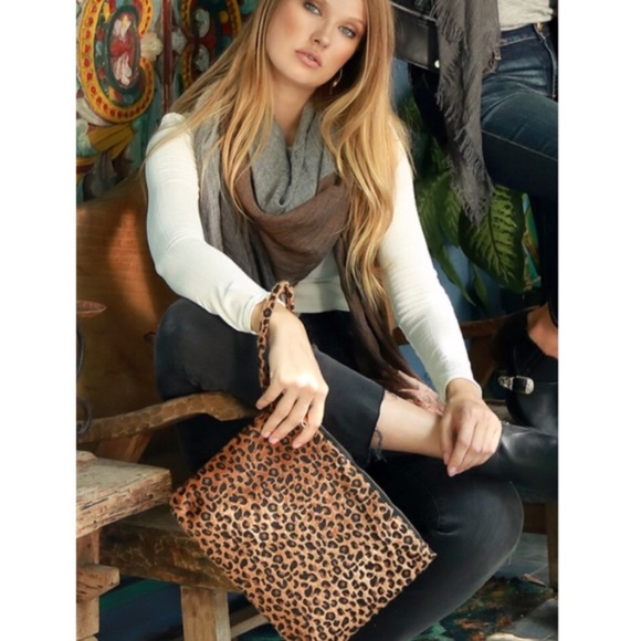 Haute Ellie Handbags - Faux Fur Animal Print Clutch/Wristlet’s